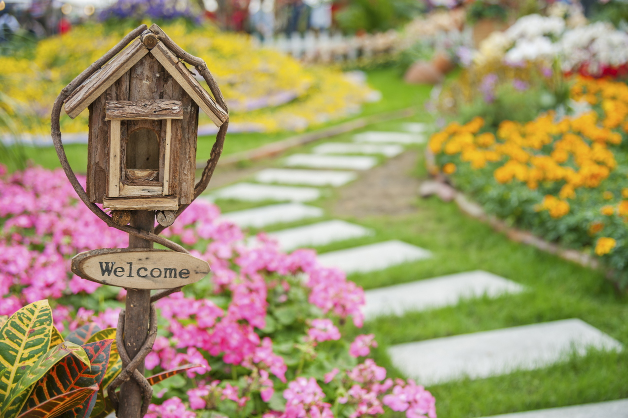 welcome-sign-on-colorful-garden