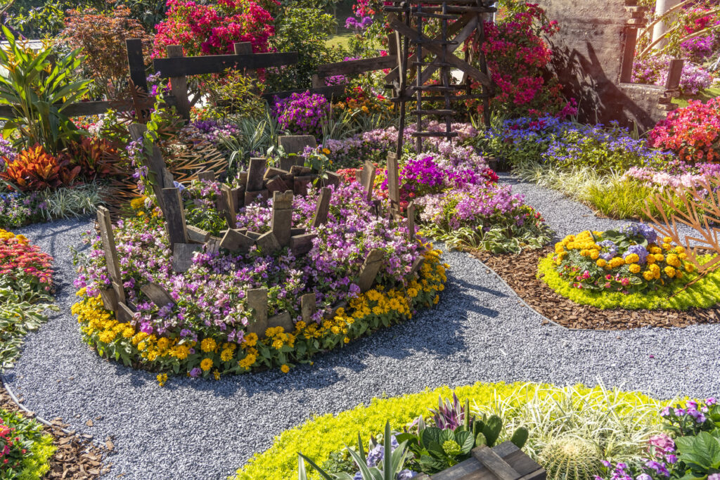 path-leading-through-a-garden-full-of-flowers